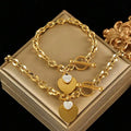 Gold-Tone Stainless Steel Heart Pendant Necklace With Toggle Clasp And Matching Charm, Water Resistant Jewelry Set For Gifting