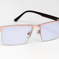 Stylish Rose Gold and Black Eyewear with Transparent Lenses