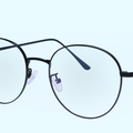 Sleek Black Metal Round Eyewear with Minimalist Design